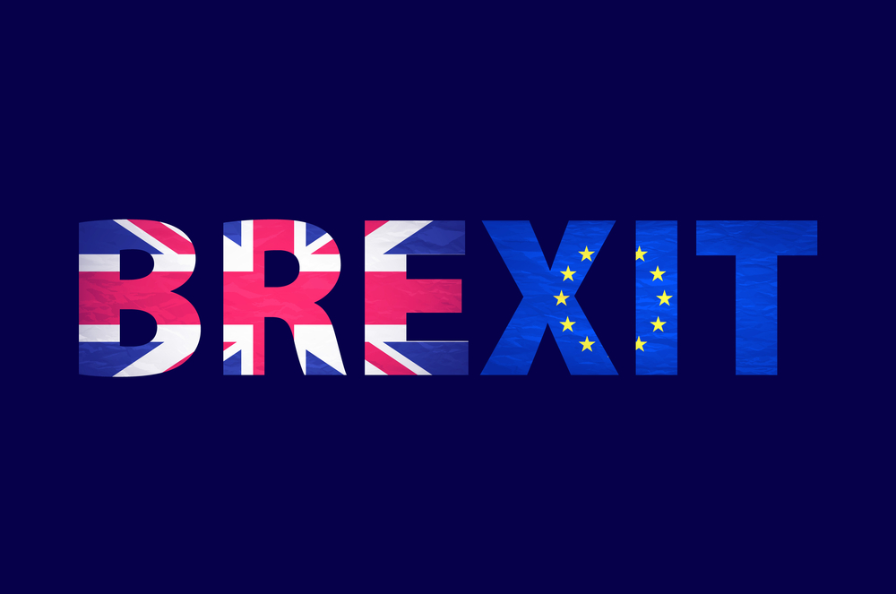 BREXIT written with EU flag and British flag