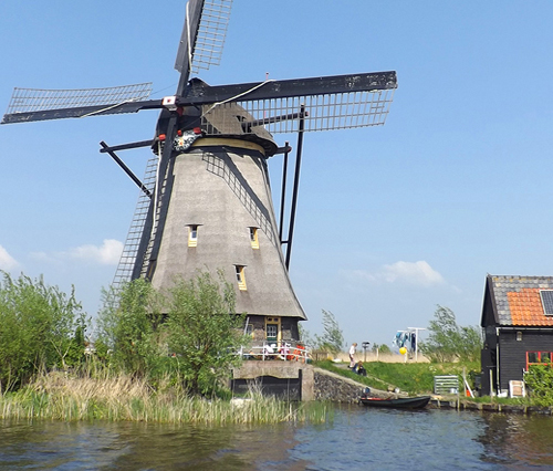 family living in Dutch windmill in Holland